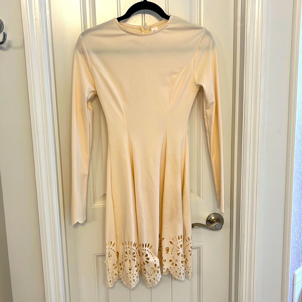 Light Cream long sleeve dress with laser cutouts